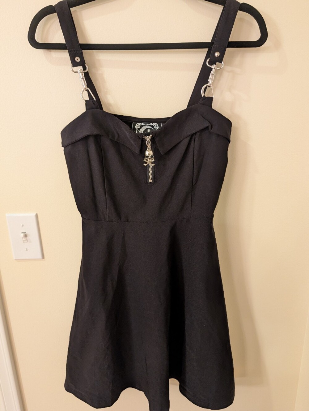 Black Strappy Mini Dress with Skull Zip Accent